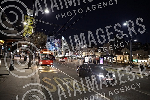 Roundabout on Slavija Square with illuminated fountain at night.Kruzni tok na Trgu Slavija  sa osvijetljenom fontanom nocu.