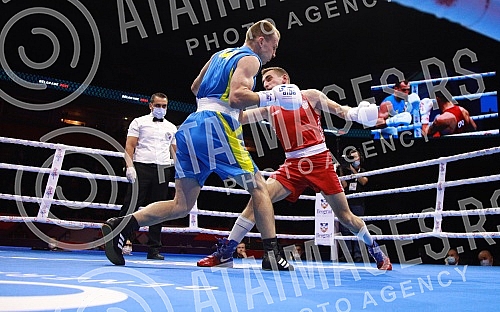 2021 Olympic Boxing World Championships - Stark Arena. Round 32, Light Welterweight (63.5kg), Mateo Komadina (Croatia) (RED) vs Denys Pesotskyy (Ukraine).Svetsko prvenstvo u olimpijskom boksu 2021 - Stark arena.
