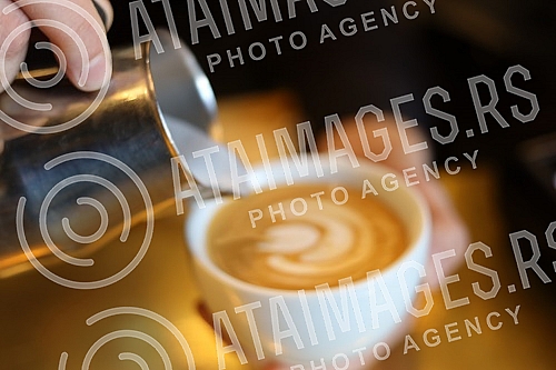 Espresso coffee with milk. Espreso kafa sa mlekom.