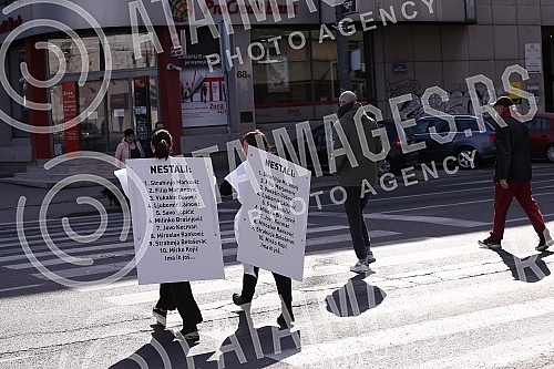 In front of the main entrance of the Police Administration for the city of Belgrade, a gathering called 