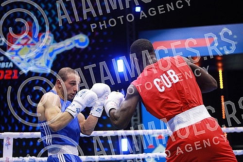 2021 Olympic Boxing World Championships - Stark Arena. Round 32, Men's Middle (75kg), Yoenlis Felician Hernandez Martinez (Cuba) (RED) vs Zharkynbek Turatov (Turkey).Svetsko prvenstvo u olimpijskom boksu 2021 - Stark arena.