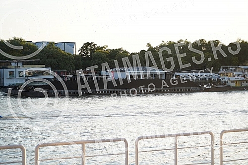 The coal on the barge floats on the Sava River in the direction of Obrenovac.Ugalj na barzi plovi rekom Savom u pravcu  Obrenovca.
