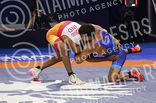 Borba za bronzanu medalju u kategoriji do 65 kg slobodnim stilom, Bajrang Bajrang (Indija) vs Sebastian C Rivera (Puerto Rico).