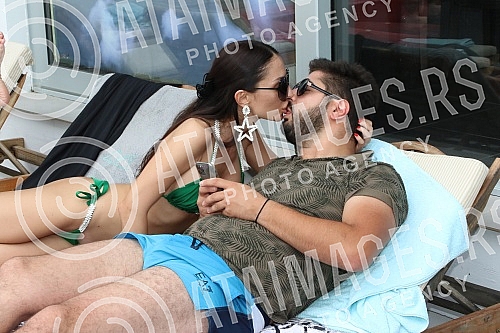 Singer Anastasija Budjic with husband Ivan Radovic - Koki at swimming pool.Pevacica Anastasija Budjic sa muzem Ivanom Radovicem - Koki na bazenu.