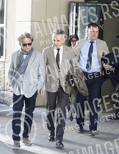 Dragan Bjelorglic and his lawyers are leaving the First Basic Court in Belgrade, where the trial for the criminal act of violent behavior began today. Dragan Bjelorglic i advokati izlaze iz Prvog osnovnog suda u Beogradu gde je danas pocela sudjenj