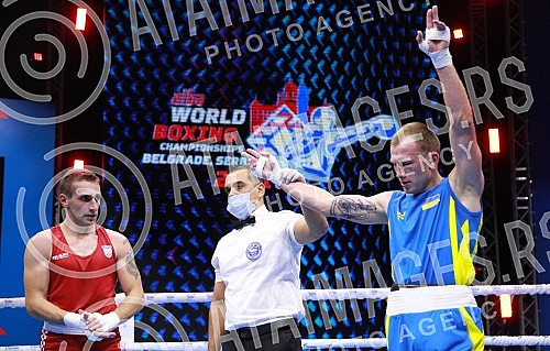 2021 Olympic Boxing World Championships - Stark Arena. Round 32, Light Welterweight (63.5kg), Mateo Komadina (Croatia) (RED) vs Denys Pesotskyy (Ukraine).Svetsko prvenstvo u olimpijskom boksu 2021 - Stark arena.