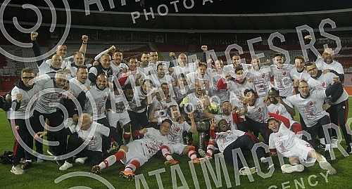 The Red Star football players are celebrating winning the fourth title in a row at the Rajko Mitic Stadium.Fudbaleri Crvene zvezde proslavljaju osvajanje cetvrte titule u nizu.