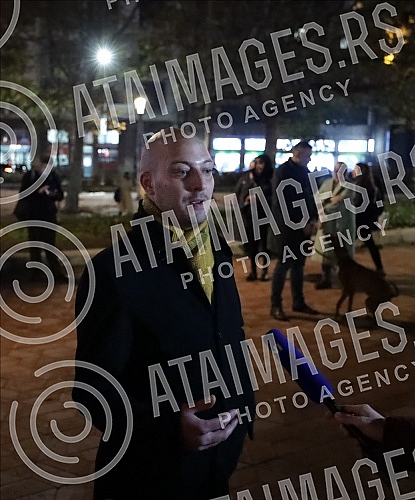 Activists, citizens, representatives of NGOs and opposition political parties gathered in front of the House of Trade Unions in support of activist Aida Corovic, who was detained earlier today for throwing eggs at a mural by Ratko Mladic painted on t