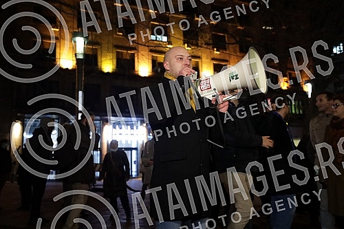 Activists, citizens, representatives of NGOs and opposition political parties gathered in front of the House of Trade Unions in support of activist Aida Corovic, who was detained earlier today for throwing eggs at a mural by Ratko Mladic painted on t
