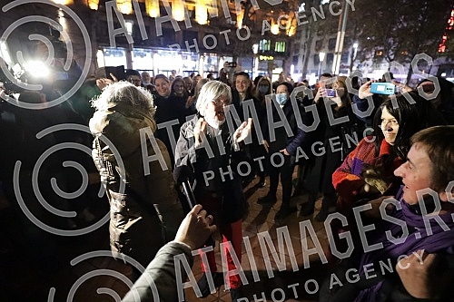 Activists, citizens, representatives of NGOs and opposition political parties gathered in front of the House of Trade Unions in support of activist Aida Corovic, who was detained earlier today for throwing eggs at a mural by Ratko Mladic painted on t