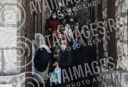 Orthodox believers in front of and in the Church of St. Petka on Kalemegdan on the occasion of the baptism of St. Petka. Pravoslavni vernici ispred i u Crkvi Svete Petke na Kalemegdanu povodom krsne slave Sveta Petka.