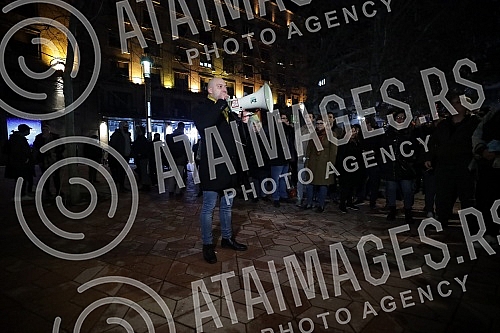 Activists, citizens, representatives of NGOs and opposition political parties gathered in front of the House of Trade Unions in support of activist Aida Corovic, who was detained earlier today for throwing eggs at a mural by Ratko Mladic painted on t