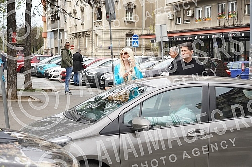 Singer Jelena Karleusa has arrived at the First Basic Public Prosecutor's Office in Belgrade, where she is to be questioned as a citizen on the occasion of her report on Christmas Day, January 7, that her footballer husband Dusko Tosic was violent to