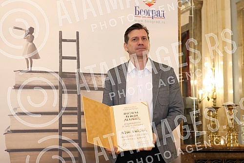 The ceremonial awarding of the newly established Dusan Radovic Award for Literature for Children and Youth was held in the Ceremonial Hall of the Belgrade City Assembly, organized by the Belgrade City Library.U Svecanoj sali Skupstine grada Beograd