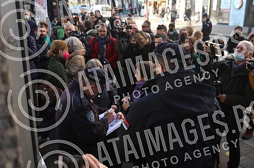 Natasa Kandic and Women in Black pasted graffiti dedicated to Ratko Mladic on the building of the Youth Center.Natasa Kandic i Zene u crnom prelepile su grafit posvecen Ratku Mladicu na zgradi Doma omladine.