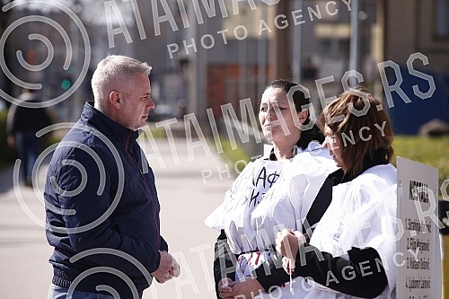 In front of the main entrance of the Police Administration for the city of Belgrade, a gathering called 