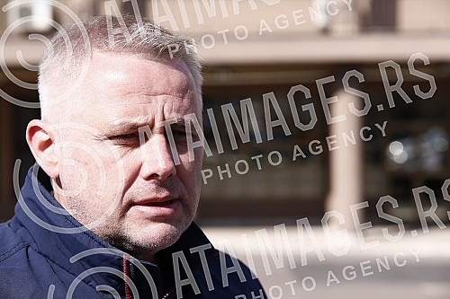 In front of the main entrance of the Police Administration for the city of Belgrade, a gathering called 