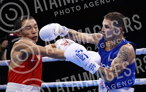 2021 Olympic Boxing World Championships - Stark Arena. Round 16, Minimumweight ( 46 - 48kg), Temirtas Zhussupov (Kazakhstan) (RED) vs Omer Ametovic (Serbia). Svetsko prvenstvo u olimpijskom boksu 2021 - Stark arena.