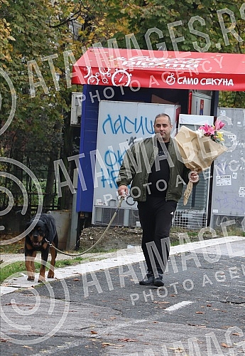 President of the Serbian right Misa Vacic on a walk with his pet Rottweiler Atila. Predsednik Srpske desnice Misa Vacic u setnji sa ljubimcem rotvajlerom Atilom.