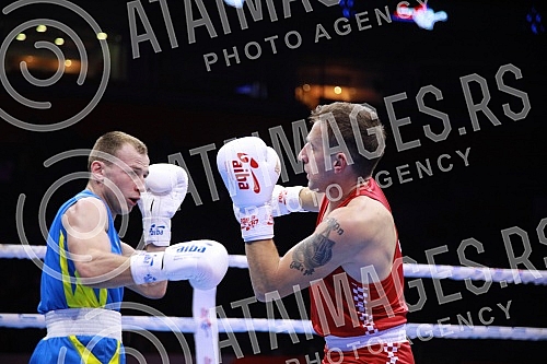 2021 Olympic Boxing World Championships - Stark Arena. Round 32, Light Welterweight (63.5kg), Mateo Komadina (Croatia) (RED) vs Denys Pesotskyy (Ukraine).Svetsko prvenstvo u olimpijskom boksu 2021 - Stark arena.