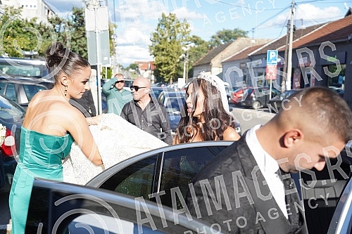 Bojana Rodic and Mirko Sijan, accompanied by relatives and friends, arrived for the wedding in the Church in Surcin, where Mirko was baptized as a baby. Bojana Rodic and Mirko Sijan, accompanied by relatives and friends, arrived for the wedding in the Church in Surcin, where Mirko was baptized as a baby.