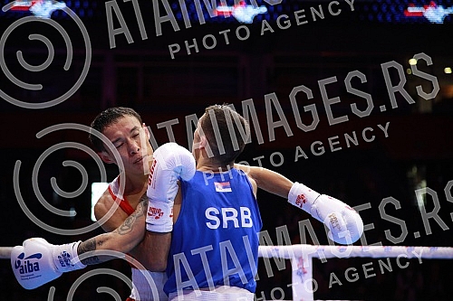 2021 Olympic Boxing World Championships - Stark Arena. Round 16, Minimumweight ( 46 - 48kg), Temirtas Zhussupov (Kazakhstan) (RED) vs Omer Ametovic (Serbia). Svetsko prvenstvo u olimpijskom boksu 2021 - Stark arena.