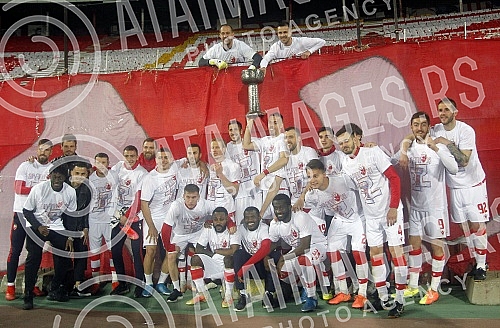 The Red Star football players are celebrating winning the fourth title in a row at the Rajko Mitic Stadium.Fudbaleri Crvene zvezde proslavljaju osvajanje cetvrte titule u nizu.