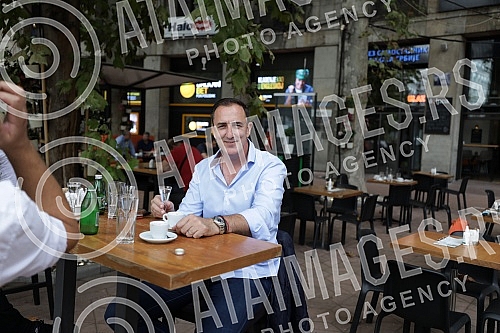 Singer Sergej Cetkovic with friends at coffee in Soljica Specialty Coffee and Drink Bar on Nikola Pasic Square.Pevac Sergej Cetkovic sa prijateljima na kafi u Soljica Specialty Coffee and Drink Bar na Trgu Nikole Pasica.