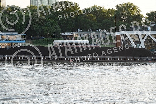 The coal on the barge floats on the Sava River in the direction of Obrenovac.Ugalj na barzi plovi rekom Savom u pravcu  Obrenovca.