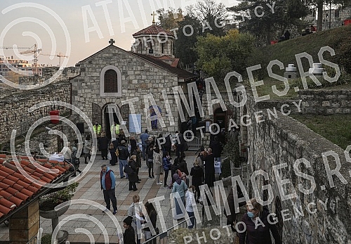 Orthodox believers in front of and in the Church of St. Petka on Kalemegdan on the occasion of the baptism of St. Petka. Pravoslavni vernici ispred i u Crkvi Svete Petke na Kalemegdanu povodom krsne slave Sveta Petka.