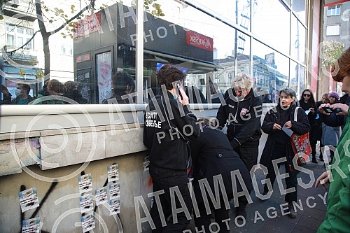 Natasa Kandic and Women in Black pasted graffiti dedicated to Ratko Mladic on the building of the Youth Center.Natasa Kandic i Zene u crnom prelepile su grafit posvecen Ratku Mladicu na zgradi Doma omladine.