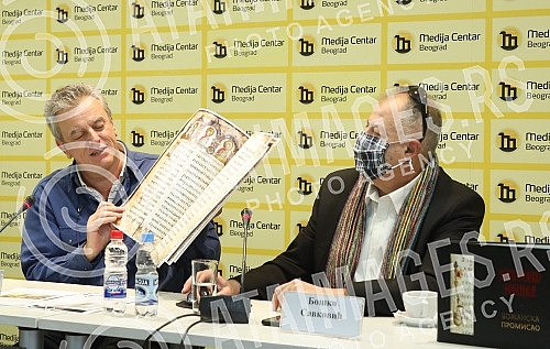 The organizer of the facsimile of Miroslav's Gospel, Veljko Topalovic, and the author of the documentary series on the history of the manuscript, Bosko Savkovic, held a press conference to discuss the damage to Miroslav's Gospel.Priredjivac faksimi