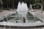 The children sought refreshment in the fountain on Nikola Pasic Square during hot July day. Deca su potrazila osvezenje u fontani na Trgu Nikole Pasica tokom vrelog julskog dana