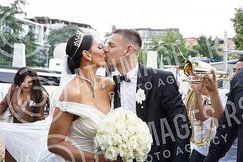 The church wedding of singer Katarina Grujic and football player Marko Gobeljic was held in the Church of St. Sava.Crkveno vencanje pevacice Katarina Grujic i fudbalera Marko Gobeljic odrzano je u Hramu Svetog Save.