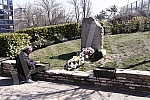 Remembrance, flowers and lighting of candles on the monument 