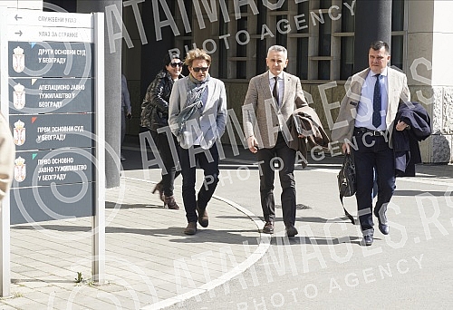 Dragan Bjelorglic and his lawyers are leaving the First Basic Court in Belgrade, where the trial for the criminal act of violent behavior began today. Dragan Bjelorglic i advokati izlaze iz Prvog osnovnog suda u Beogradu gde je danas pocela sudjenj