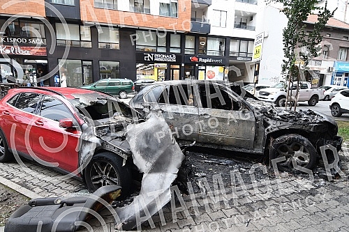Two cars burned down on October 6, around midnight in Strazilovska Street in Novi Sad, and as it was later determined, it was a Mercedes A class owned by U.J. a girl recently beaten by Slobodan Milutinovic aka Sniper and a BMW X5 jeep owned by her fa