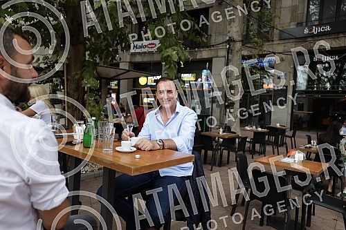 Singer Sergej Cetkovic with friends at coffee in Soljica Specialty Coffee and Drink Bar on Nikola Pasic Square.Pevac Sergej Cetkovic sa prijateljima na kafi u Soljica Specialty Coffee and Drink Bar na Trgu Nikole Pasica.