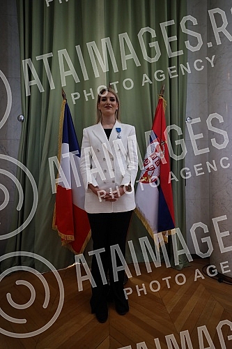 French Ambassador Pierre Cochard presented the National Order of Merit to basketball player Natasa Kovacevic StojakovicAmbasador Francuske Pjer Kosar urucio je Nacionalni orden za zasluge kosarkasici Natasi Kovacevic Stojakovic.