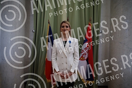 French Ambassador Pierre Cochard presented the National Order of Merit to basketball player Natasa Kovacevic StojakovicAmbasador Francuske Pjer Kosar urucio je Nacionalni orden za zasluge kosarkasici Natasi Kovacevic Stojakovic.
