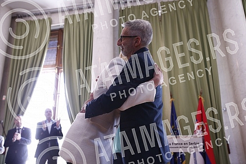 French Ambassador Pierre Cochard presented the National Order of Merit to basketball player Natasa Kovacevic StojakovicAmbasador Francuske Pjer Kosar urucio je Nacionalni orden za zasluge kosarkasici Natasi Kovacevic Stojakovic.