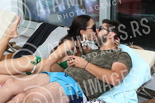 Singer Anastasija Budjic with husband Ivan Radovic - Koki at swimming pool.Pevacica Anastasija Budjic sa muzem Ivanom Radovicem - Koki na bazenu.