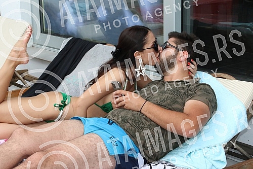 Singer Anastasija Budjic with husband Ivan Radovic - Koki at swimming pool.Pevacica Anastasija Budjic sa muzem Ivanom Radovicem - Koki na bazenu.