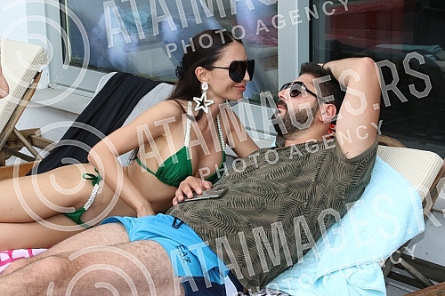 Singer Anastasija Budjic with husband Ivan Radovic - Koki at swimming pool.Pevacica Anastasija Budjic sa muzem Ivanom Radovicem - Koki na bazenu.
