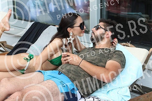 Singer Anastasija Budjic with husband Ivan Radovic - Koki at swimming pool.Pevacica Anastasija Budjic sa muzem Ivanom Radovicem - Koki na bazenu.