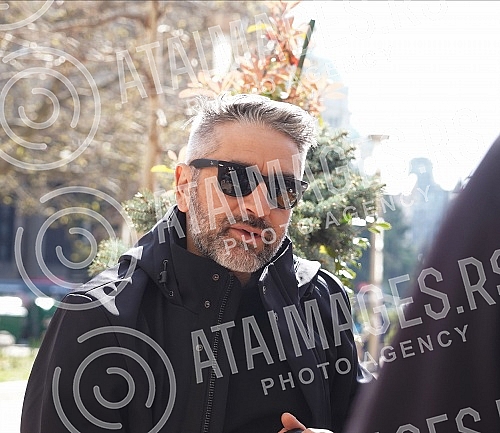 Director Srdan Golubovic is sitting in the garden of a cafe on Nikola Pasic Square.Reditelj Srdan Golubovic sedi u basti kafica na Trgu Nikole Pasica.