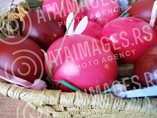 The red color is a symbol of joy and resurrection, and the first red egg is kept until the next Easter as a 