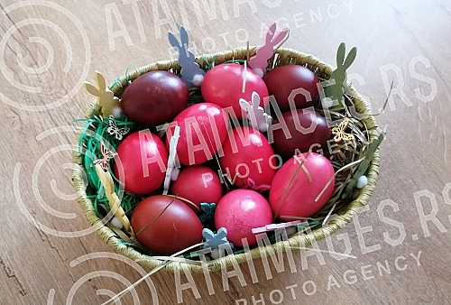 The red color is a symbol of joy and resurrection, and the first red egg is kept until the next Easter as a 