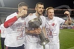 The Red Star football players are celebrating winning the fourth title in a row at the Rajko Mitic Stadium.Fudbaleri Crvene zvezde proslavljaju osvajanje cetvrte titule u nizu.