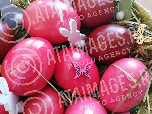 The red color is a symbol of joy and resurrection, and the first red egg is kept until the next Easter as a 